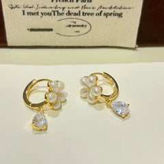 Angled view of the 14K Gold-Plated Diamond Flower Earrings