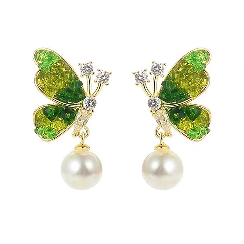 Close-up detail of the sparkling zircons and plating on the Green Butterfly Earrings