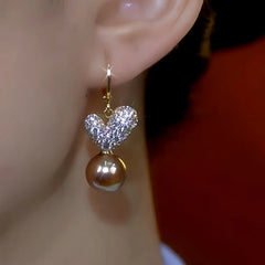 Close-up detail of the sparkling zircons and plating on the Brown Pearl Earrings