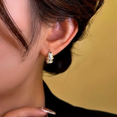 Close-up detail of the sparkling zircons and plating on the Pave Hoop Earrings