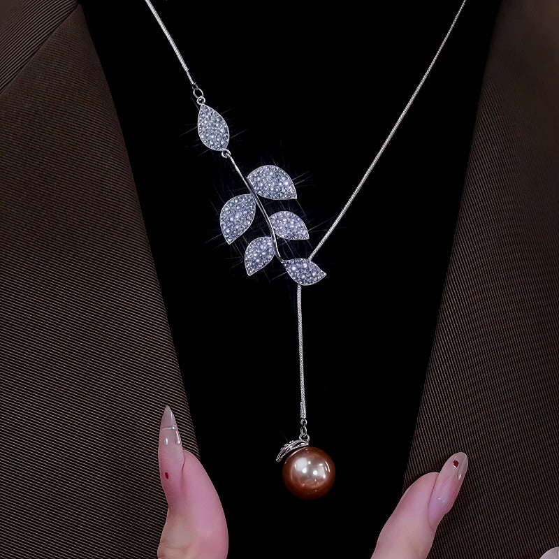 14K Gold-Plated Diamond Leaf Pearl Necklace worn to showcase its length and pendant detail