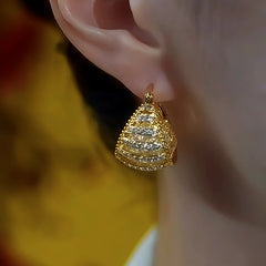 Close-up detail of the sparkling zircons and plating on the Gold Mesh Earrings