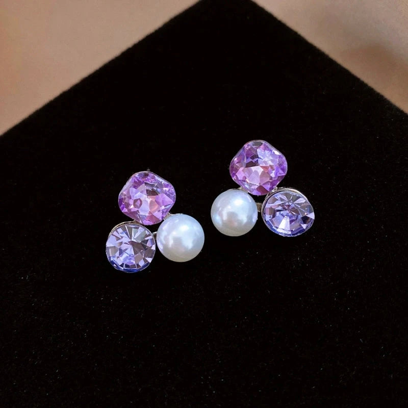 Close-up detail of the sparkling zircons and plating on the Pearl Stud Earrings