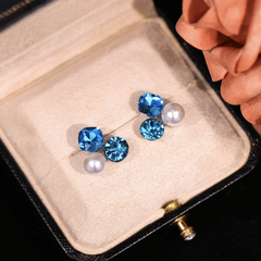 Angled view of the 14K Gold-Plated Diamond Pearl Stud Earrings