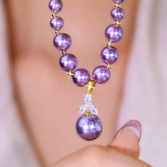 Close-up of the pendant and clasp on the Purple Pearl Necklace