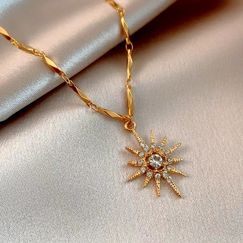 Detailed view of the 14K Gold-Plated Diamond Sun Necklaces chain and pendant
