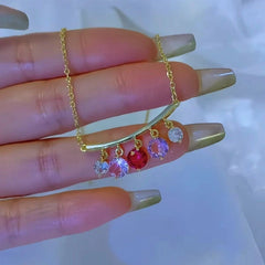 Close-up of the pendant and clasp on the Colorful Tassel Necklace