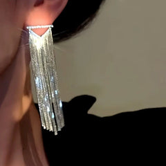 Close-up detail of the sparkling zircons and plating on the White Gold Tassel Earrings