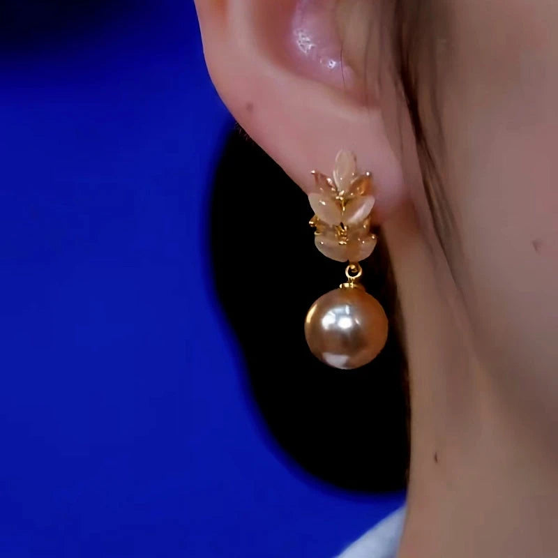 Close-up detail of the sparkling zircons and plating on the Wheat Pearl Earrings