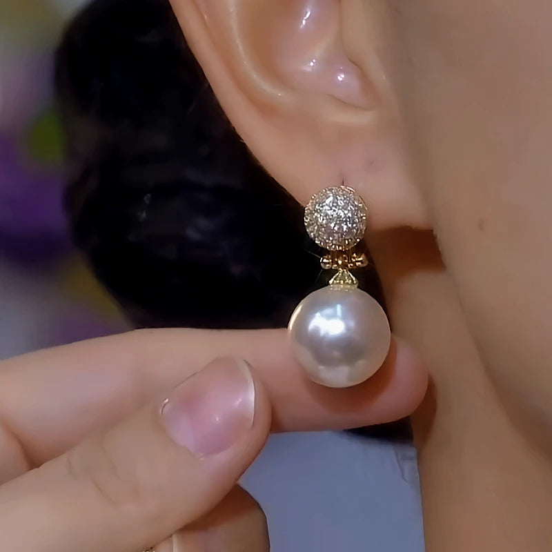 Close-up detail of the sparkling zircons and plating on the White Pearl Earrings