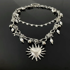 Close-up of the pendant and clasp on the Star Heart Necklace