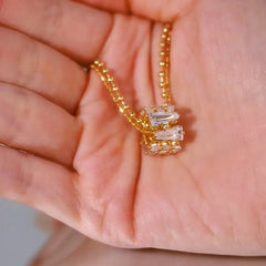 Detailed view of the 14K Gold-Plated Double-Layer Zircon RIng Pendant Necklace chain and pendant