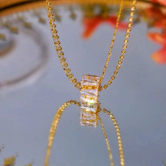 Close-up of the pendant and clasp on the Ring Pendant Necklace