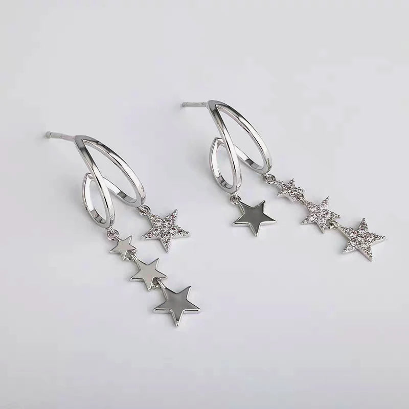 Angled view of the 14K Gold-Plated Double-Layer Zircon Star Tassel Earrings