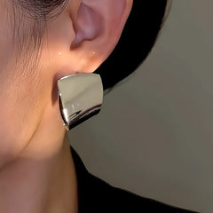 Close-up detail of the sparkling zircons and plating on the Double-Sided Earrings