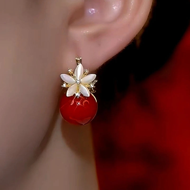Close-up detail of the sparkling zircons and plating on the Double-Sided Flower Earrings