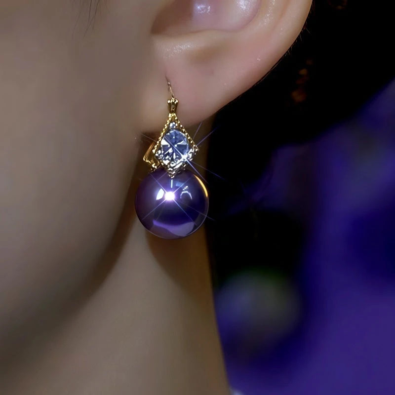 Close-up detail of the sparkling zircons and plating on the Double-Sided Pearl Earrings