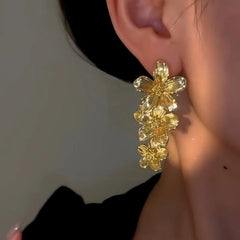 Close-up detail of the sparkling zircons and plating on the Flower Tassel Earrings