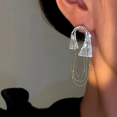 Close-up detail of the sparkling zircons and plating on the Chain Tassel Earrings