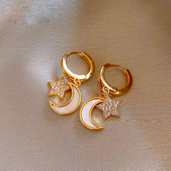 Close-up detail of the sparkling zircons and plating on the Moon Tassel Earrings