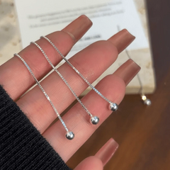 Close-up detail of the sparkling zircons and plating on the Bean Threader Earrings