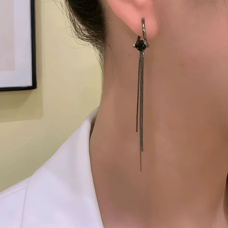 Close-up detail of the sparkling zircons and plating on the Black Tassel Earrings