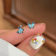 Angled view of the 14K Gold-Plated Elegant Blue Butterfly Stud Earrings