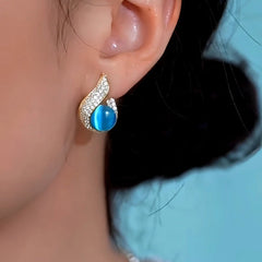 Close-up detail of the sparkling zircons and plating on the Blue Cat's Eye Earrings