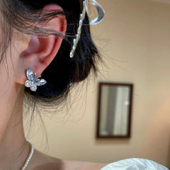 Close-up detail of the sparkling zircons and plating on the Blue Crystal Butterfly Studs