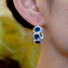 Close-up detail of the sparkling zircons and plating on the Blue Zircon Hoops