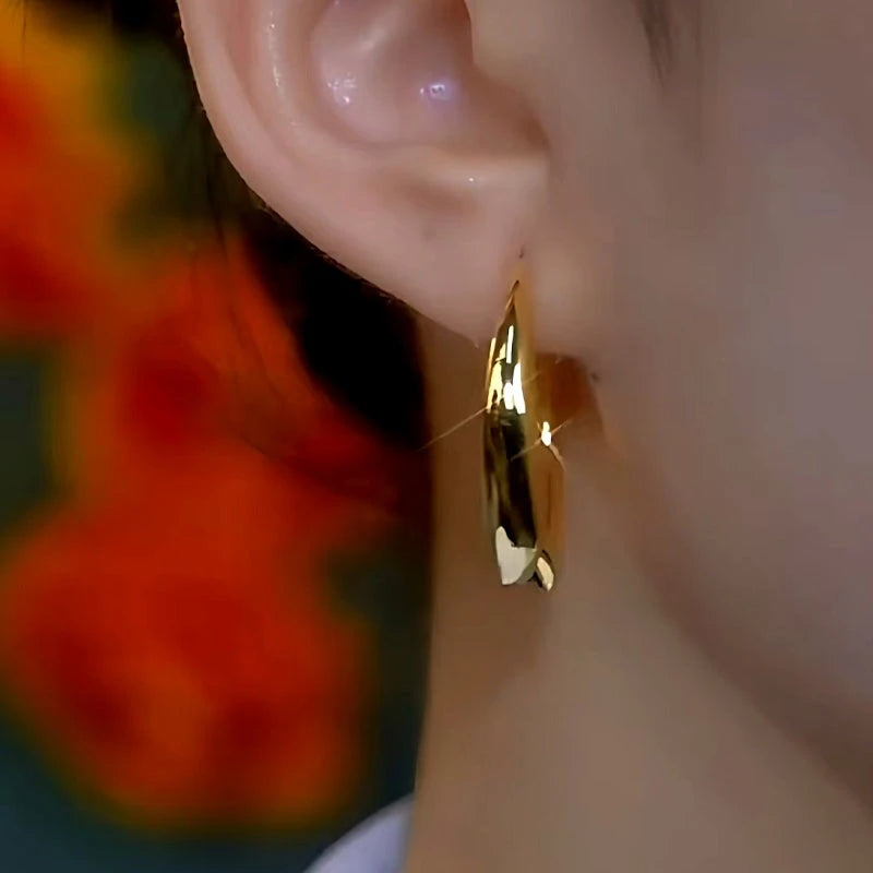 Close-up detail of the sparkling zircons and plating on the Brown Diamond Hoops