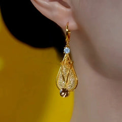 Close-up detail of the sparkling zircons and plating on the Water Drop Earrings