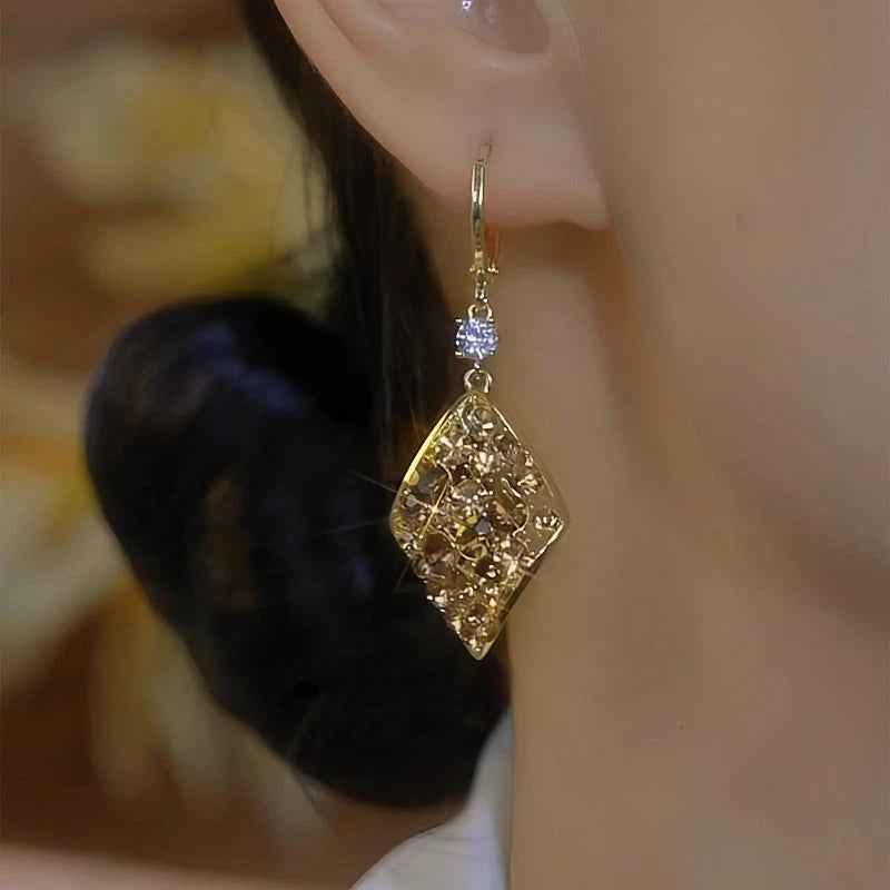 Close-up detail of the sparkling zircons and plating on the Brown Zircon Earrings