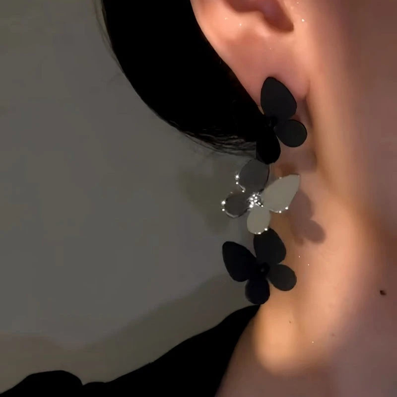 Close-up detail of the sparkling zircons and plating on the Butterfly Tassel Earrings