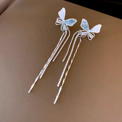 Angled view of the 14K Gold-Plated Elegant Butterfly Tassel Earrings
