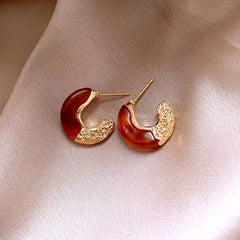 Angled view of the 14K Gold-Plated Elegant C-Ring Earrings