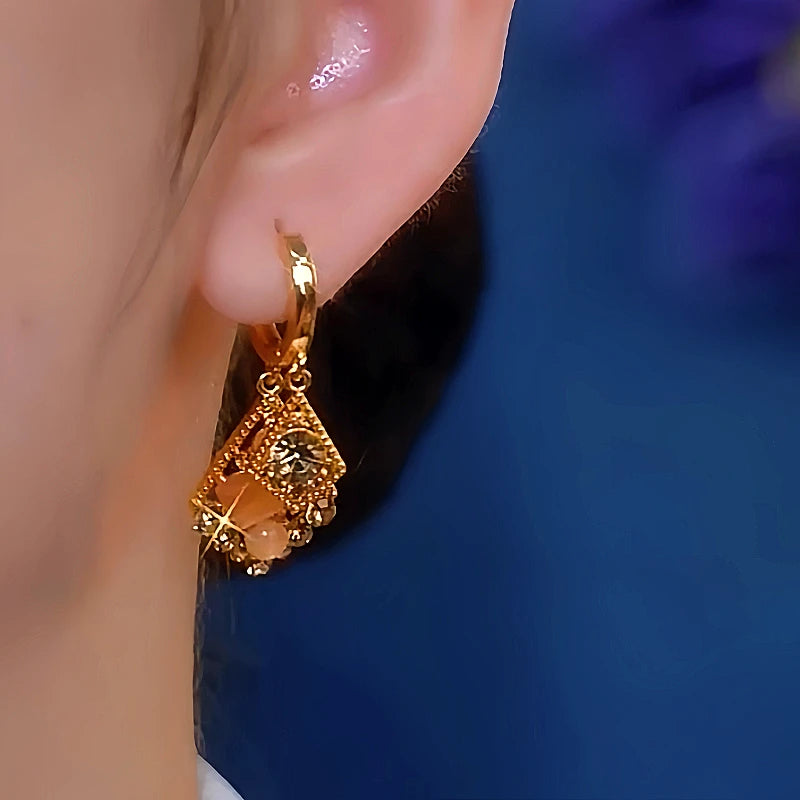 Close-up detail of the sparkling zircons and plating on the Cat's Eye Earrings