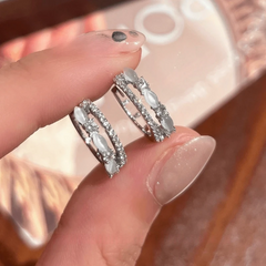 Angled view of the 14K Gold-Plated Elegant Cat's Eye Stone Double-Layer Hoop Earrings