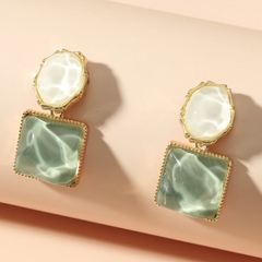 Angled view of the 14K Gold-Plated Elegant Cat's Eye Stone Earrings