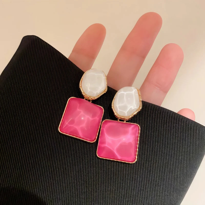 Perfect Pink Cat's Eye Earrings for adding glamour to any outfit