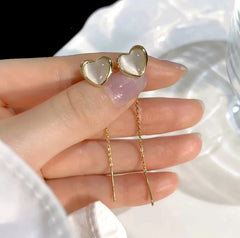 Angled view of the 14K Gold-Plated Elegant Cat's Eye Stone Heart Threader Earrings
