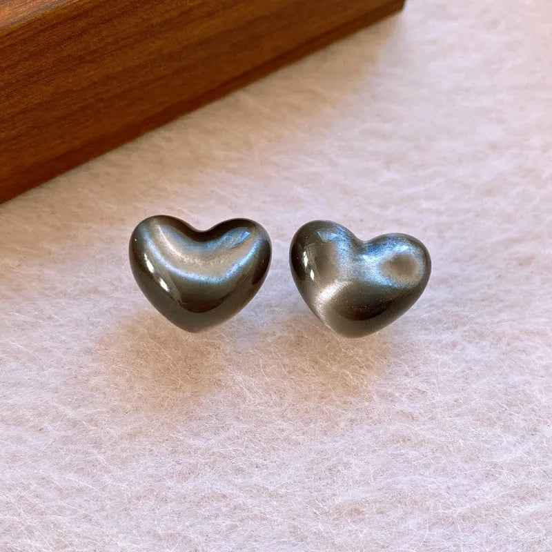 Angled view of the 14K Gold-Plated Elegant Cat's Eye Stone Stud Earrings