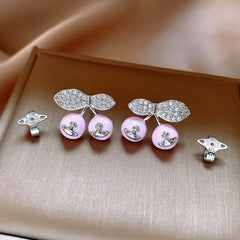 Angled view of the 14K Gold-Plated Elegant Cherry Saturn Earrings