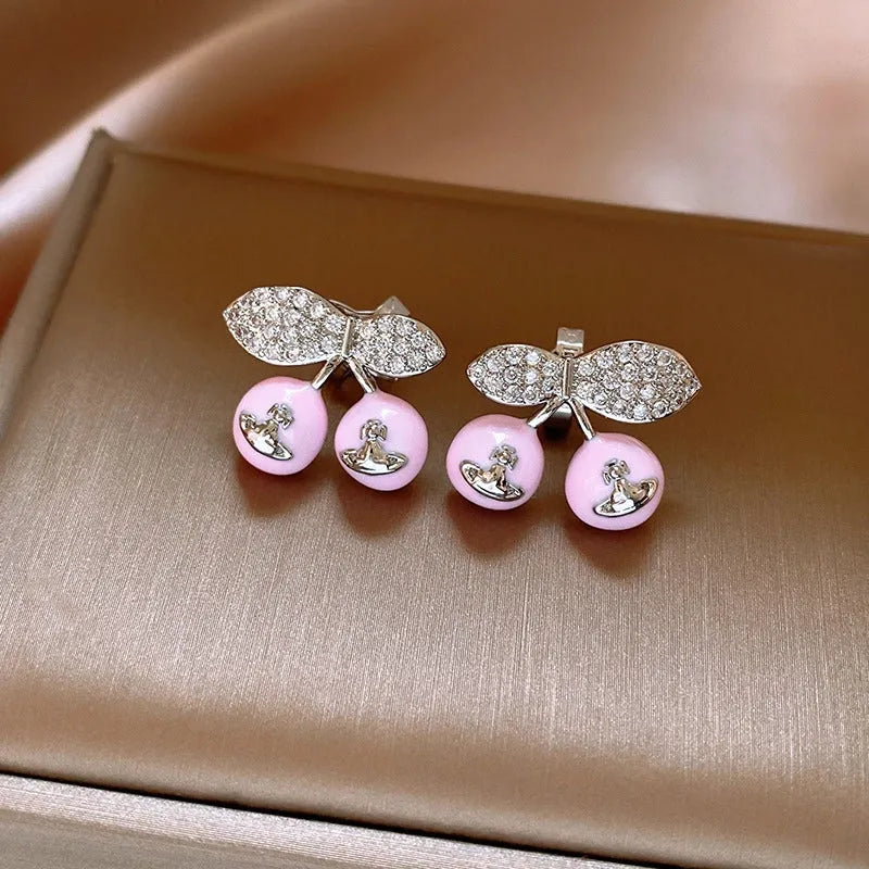 Close-up detail of the sparkling zircons and plating on the Saturn Earrings