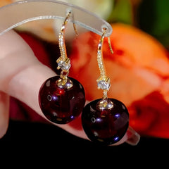 Angled view of the 14K Gold-Plated Elegant Cherry 馃崚 Ear Hook Earrings