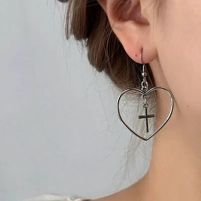 Angled view of the 14K Gold-Plated Elegant Cross Heart Ear Hook Earrings