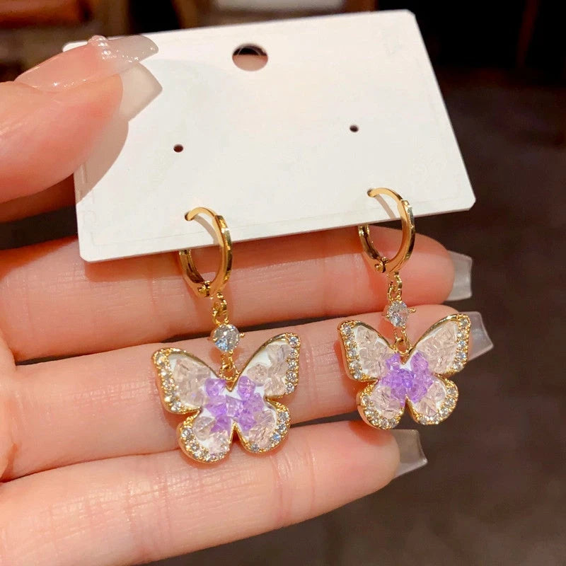 Angled view of the 14K Gold-Plated Elegant Crystal Butterfly Earrings