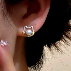 Angled view of the 14K Gold-Plated Elegant Cute Cat's Pearl Stud Earrings