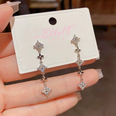 Close-up detail of the sparkling zircons and plating on the Long Tassel Earrings