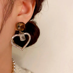 Close-up detail of the sparkling zircons and plating on the Diamond Heart Earrings